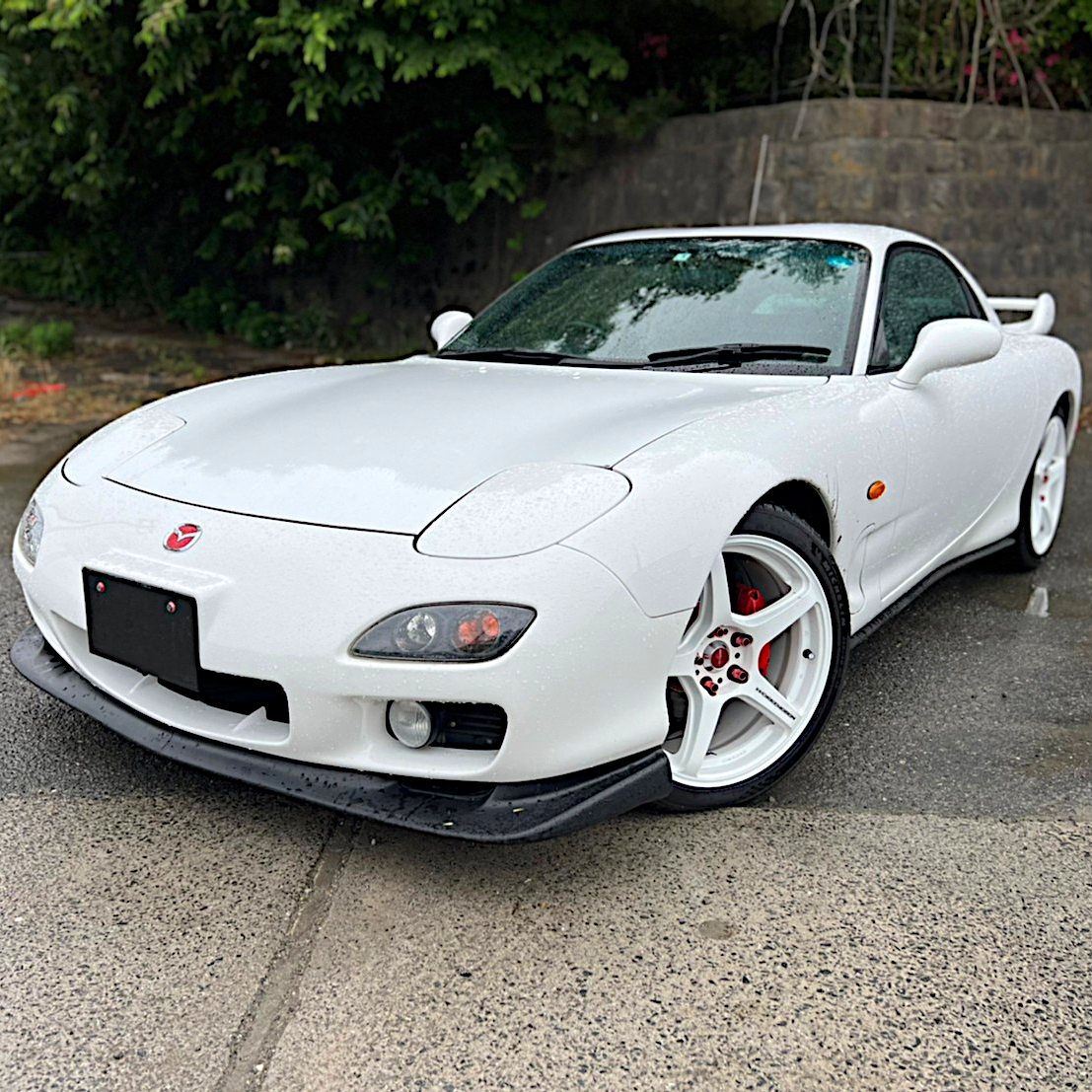 A mate's genuine Mazda RX-7 imported from Japan alongside Dyson's Supra