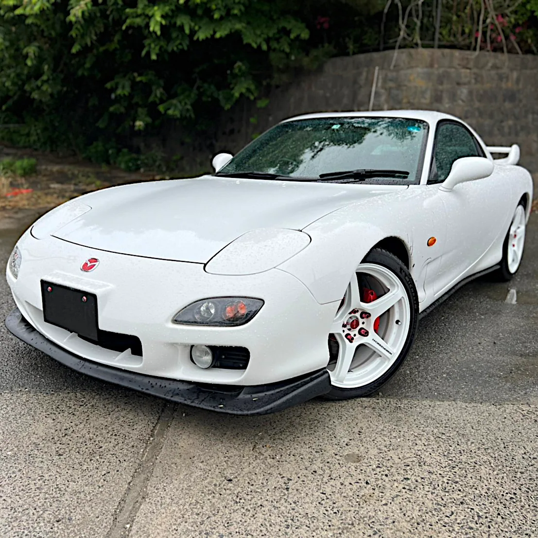 A mate's genuine Mazda RX-7 imported from Japan alongside Dyson's Supra